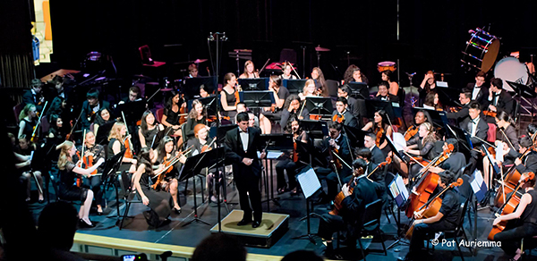 Devon getting ready to conduct his orchestral composition "Amalgamate"